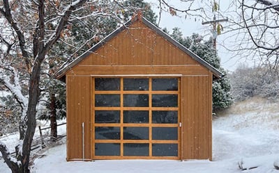 Aluminum glass garage door in winter