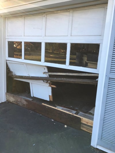 Garage Door Accidents & Why They Happen; ugly, broken garage door.jpg