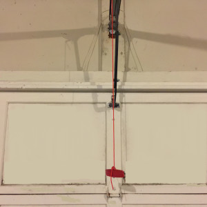 I Pulled My Garage Door Release Cord. How Do I Reattach It?