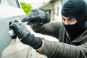 Thief Opening a Car